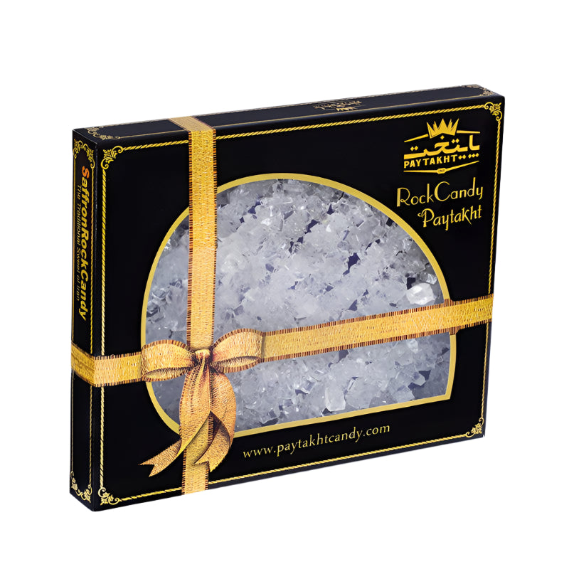 Box of crystal clear rock candy in a luxurious black and gold packaging, ideal for adding a touch of sweetness to beverages or desserts.