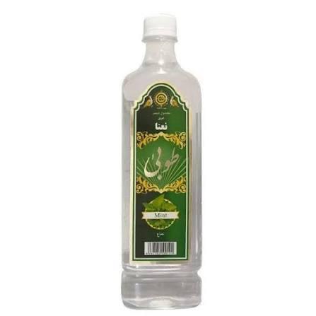 Clear bottle with green label on a white background
